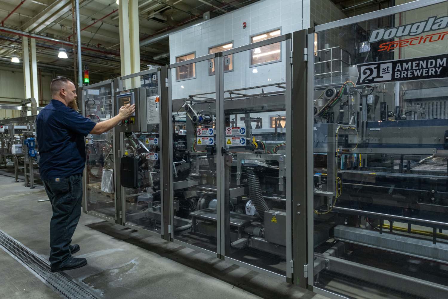 A Man Operating the Controls of a Machine